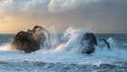 Spain, Liencres. Ocean waves and sea stack formations. Art Print